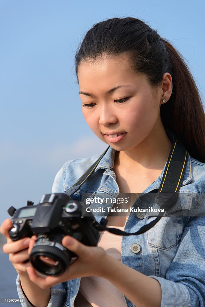 Female tourist taking pictures