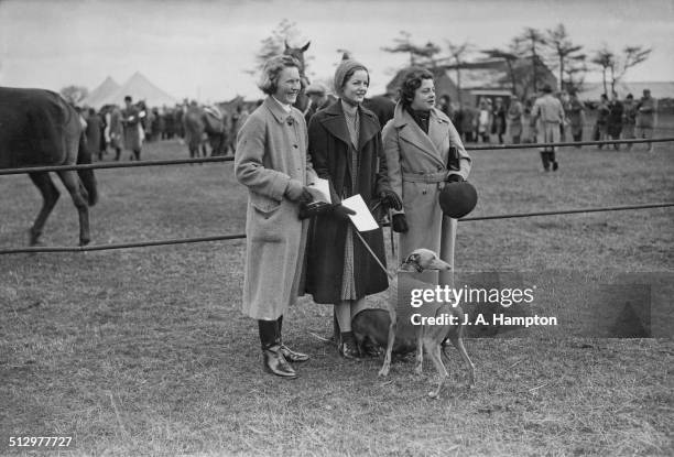 The Hon Pamela Herman Hodge, the Hon Deborah Freeman-Mitford and Lady Margaret Ogilvy, at a point-to-point steeplechase meeting at Enstone, near...