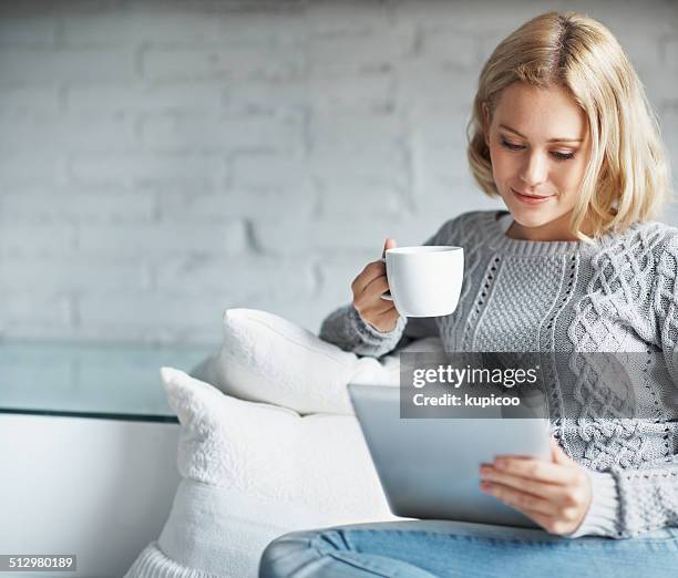 she orchestrates her mornings to the tune of coffee - white sofa stock pictures, royalty-free photos & images