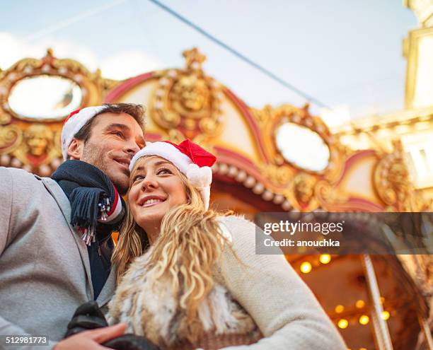 lovely spanish couple enjoying christmas in madrid - madrid christmas stock pictures, royalty-free photos & images