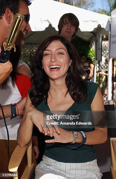 Actress Sasha Alexander has her hair styled at the Frank Studio Salon at the W Hollywood Yard Sale Preview Brunch on September 12, 2004 at a private...