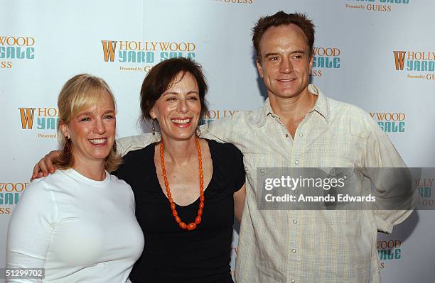 Magazine VP and Publisher Alice Alston poses with actors Jane Kaczmarek and Bradley Whitford at the W Hollywood Yard Sale Preview Brunch on September...