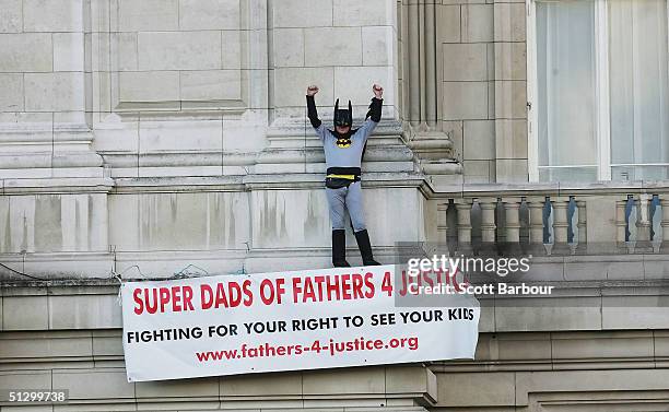 Jason Hatch , a Fathers 4 Justice campaigner dressed as Batman protests on the balcony at Buckingham Palace on September 13, 2004 in London, England....