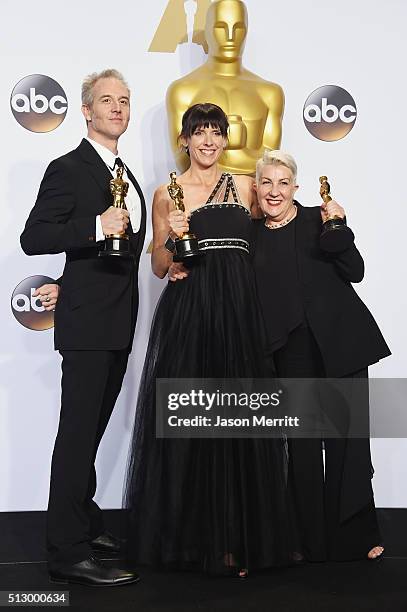 Makeup artists Damian Martin, Elka Wardega, and Lesley Vanderwalt, winners of Best Makeup for 'Mad Max,' pose in the press room during the 88th...