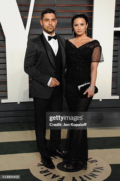 Actor Wilmer Valderrama and singer Demi Lovato attends the 2016 Vanity Fair Oscar Party hosted By Graydon Carter at Wallis Annenberg Center for the...