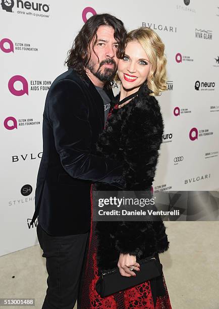 Musician Dave Grohl and Jordyn Blum attend Bulgari at the 24th Annual Elton John AIDS Foundation's Oscar Viewing Party at The City of West Hollywood...