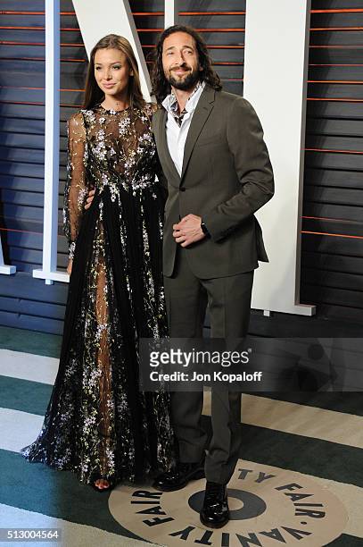 Lara Leito and actor Adrien Brody attend the 2016 Vanity Fair Oscar Party hosted By Graydon Carter at Wallis Annenberg Center for the Performing Arts...