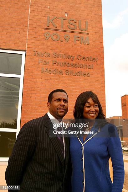 Host Tavis Smiley and Texas Southern University president Priscilla Slade pose under the name of the new Tavis Smiley Center for Professional Media...