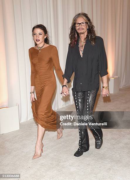 Singer Steven Tyler and guest attend Bulgari at the 24th Annual Elton John AIDS Foundation's Oscar Viewing Party at The City of West Hollywood Park...