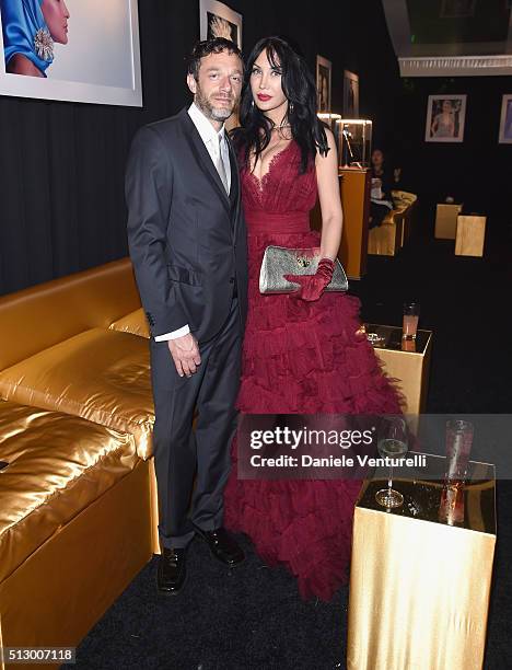 Joshua Smith and Demet Oger attend Bulgari at the 24th Annual Elton John AIDS Foundation's Oscar Viewing Party at The City of West Hollywood Park on...