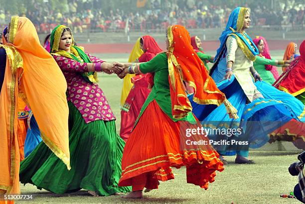 Girls from Government College for Girls perform Punjabi folk dance Gidha during the 67th Republic Day celebration at YPS Stadium, India.