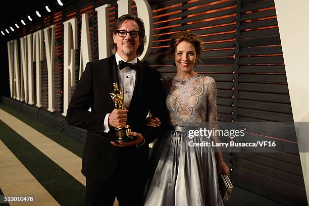 Writer Charles Randolph and actress Mili Avital attend the 2016 Vanity Fair Oscar Party Hosted By Graydon Carter at the Wallis Annenberg Center for...