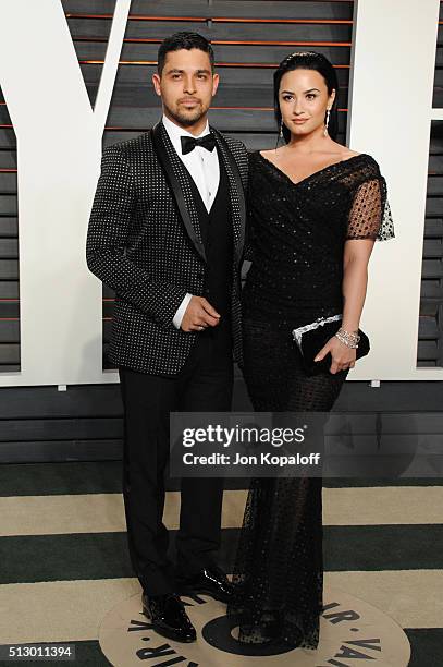 Actor Wilmer Valderrama and singer Demi Lovato attends the 2016 Vanity Fair Oscar Party hosted By Graydon Carter at Wallis Annenberg Center for the...