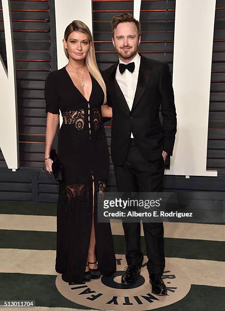 Actor Aaron Paul and Lauren Parsekian attend the 2016 Vanity Fair Oscar Party hosted By Graydon Carter at Wallis Annenberg Center for the Performing...