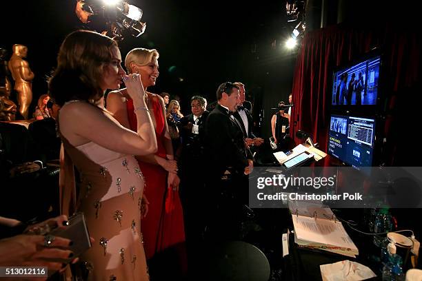 Actresses Charlize Theron and Emily Blunt backstage at the 88th Annual Academy Awards at Dolby Theatre on February 28, 2016 in Hollywood, California.