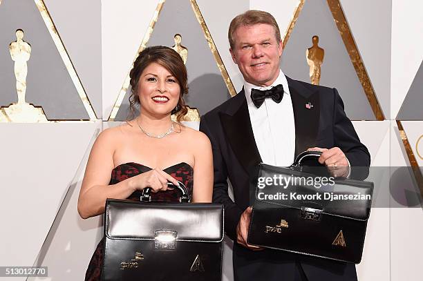 Price Waterhouse and Coopers partners Martha Ruiz and Brian Cullinan attend the 88th Annual Academy Awards at Hollywood & Highland Center on February...