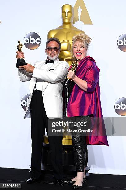 Production designer Colin Gibson and set decorator Lisa Thompson, winners of the Best Production Design award for 'Mad Max: Fury Road,' pose in the...