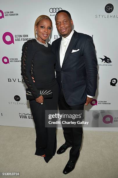 Singer Mary J. Blige and Kendu Isaacs attend Neuro at the 24th Annual Elton John AIDS Foundation's Oscar Viewing Party at The City of West Hollywood...