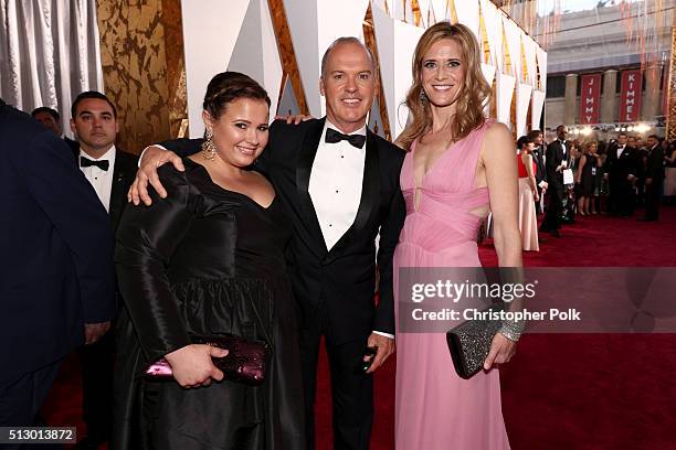 Producers Nicole Rocklin and Blye Pagon Faust pose with Michael Keaton at the 88th Annual Academy Awards at Hollywood & Highland Center on February...