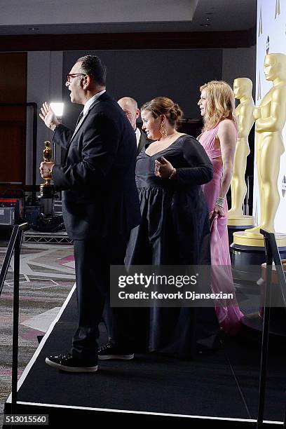 Producers Steve Golin, Nicole Rocklin, Blye Pagon Faust, and Michael Sugar, winners of Best Picture for "Spotlight," pose in the press room during...