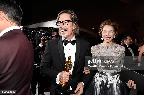 Charles Randolph, winner of the Best Writing award for 'The Big Short,' and actress Mili Avital attend the 88th Annual Academy Awards Governors Ball...