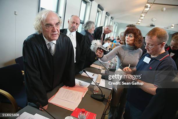 Accessory prosecutor Thomas Walther , who is representing joint plaintiff and Auschwitz survivor Walter Plywaski, speaks to the media on the first...