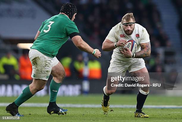 Joe Marler of England takes on Mike Ross during the RBS Six Nations match between England and Ireland at Twickenham Stadium on February 27, 2016 in...