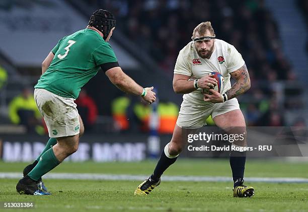 Joe Marler of England takes on Mike Ross during the RBS Six Nations match between England and Ireland at Twickenham Stadium on February 27, 2016 in...