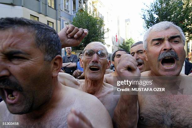 Peasants from Bergama chant "We won`t give our lands" after they took off their shirts during a demonstration in Taksim, downtown Istanbul, 14...