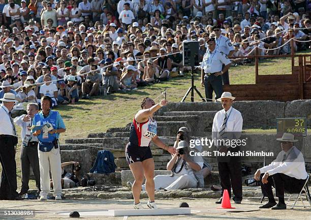 Chinatsu Mori of Japan competes in the Women's Shot Put at the Ancient Olympia Stadium during day five of the Athens Olympics on August 18, 2004 in...