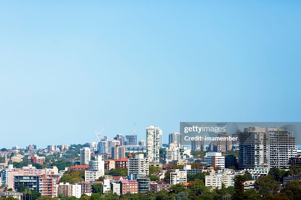 Skyline of Sydney Australia against blue sky, copy space