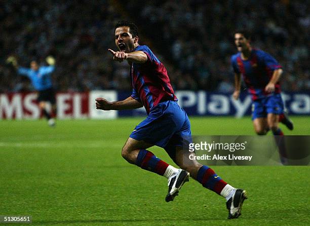 Ludovic Giuly of Barcelona celebrates scoring the second goal during the UEFA Champions League Group F match between Celtic and Barcelona at Celtic...
