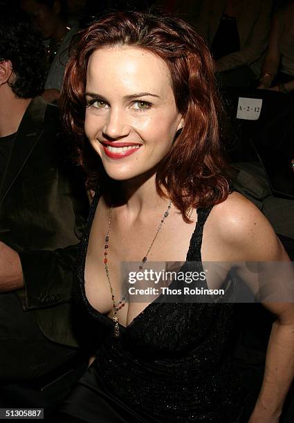 Actress Carla Gugino attends the Carmen Marc Valvo show during the Olympus Fashion Week Spring 2005 at Bryant Park September 14, 2004 in New York...