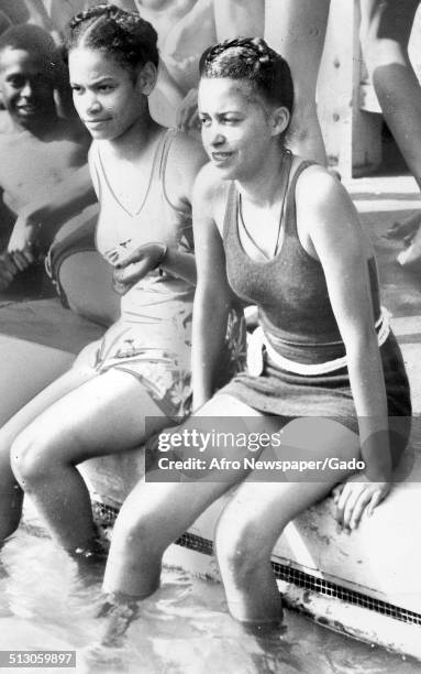 African-American girls swimming in a pool at Druid Hill Park, Baltimore, Maryland, July 19, 1947.