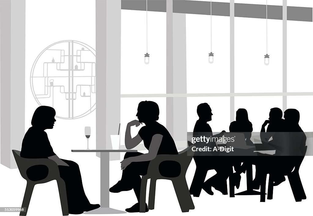 Girlfriends Chatting At A Bistro