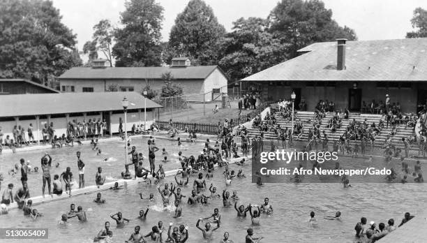 African-American children in a segregated swimming pool at Druid Hill Park, Baltimore, Maryland, 1955.