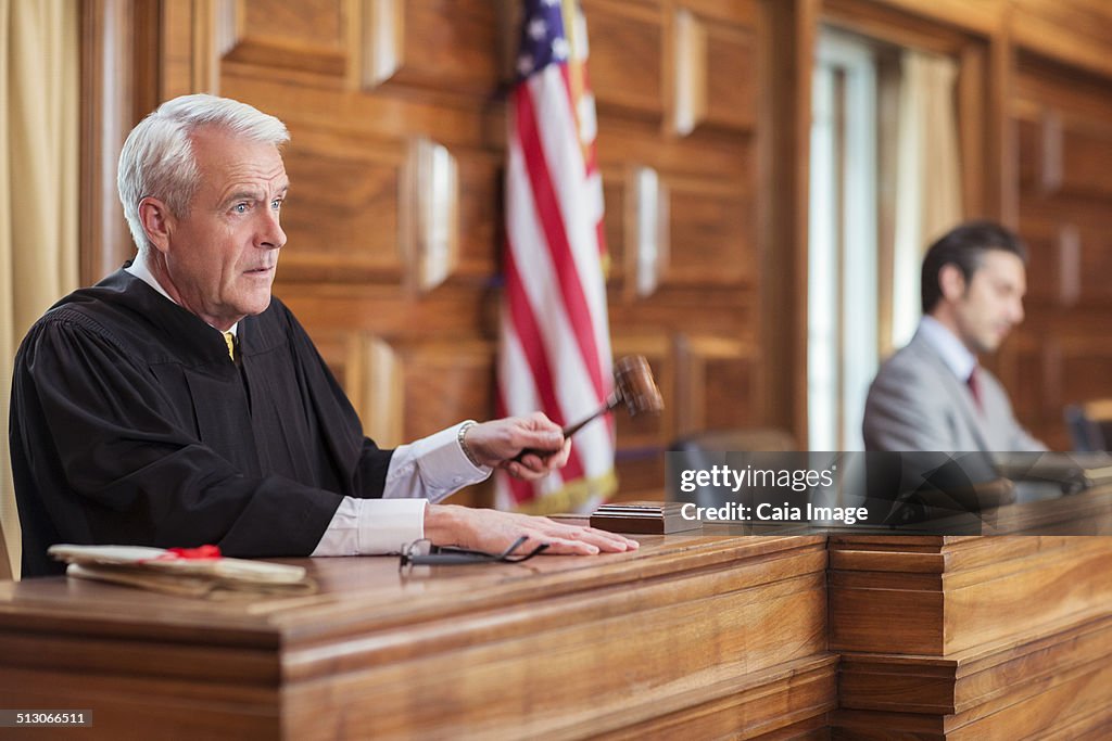 Judge banging gavel in court