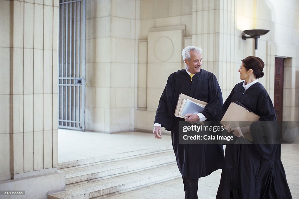 Judges walking through courthouse together