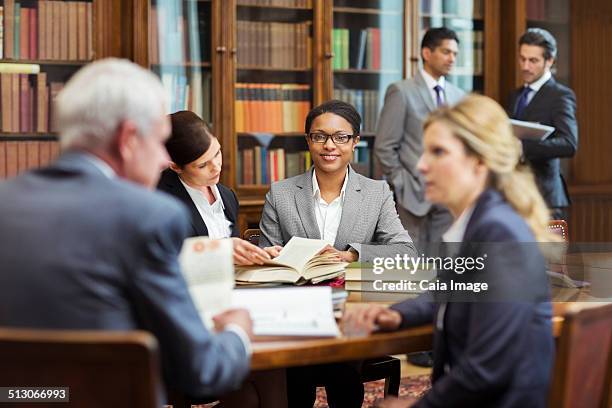lawyers talking in chambers - legal defense stock pictures, royalty-free photos & images