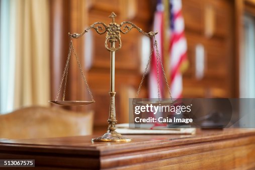 Scales of justice on the judgeÕs bench Scales of justice on the judgeÕs bench