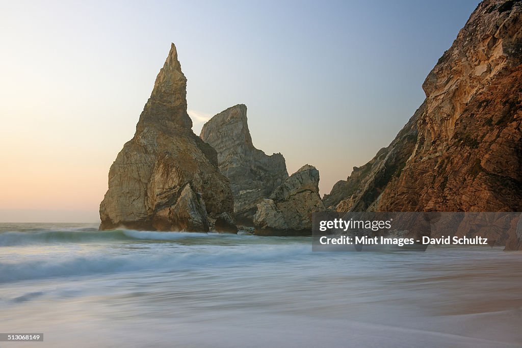 Ursa Beach on the Atlantic coastline has dramatic rock formations called the Giant and the Bear.