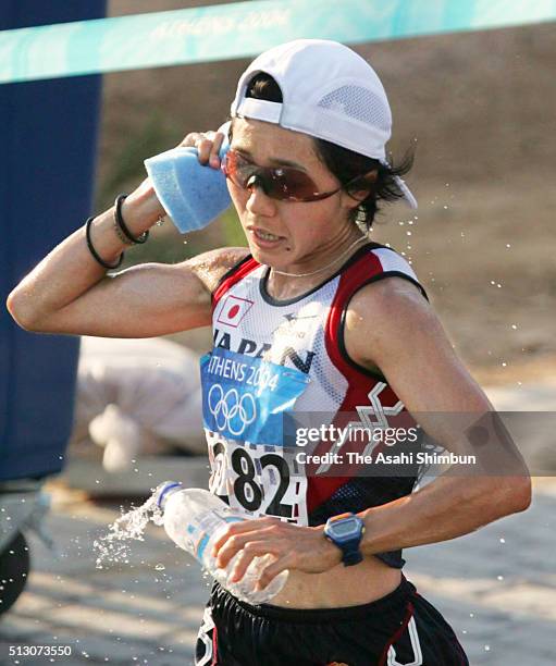 Mizuki Noguchi of Japan competes in the Women's Marathon during day nine of the Athens Olympics on August 22, 2004 in Athens, Greece.