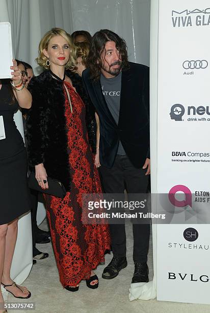 Musician Dave Grohl and Jordyn Blum attend the 24th Annual Elton John AIDS Foundation's Oscar Viewing Party on February 28, 2016 in West Hollywood,...