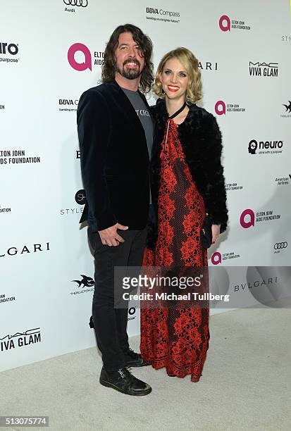 Musician Dave Grohl and Jordyn Blum attends the 24th Annual Elton John AIDS Foundation's Oscar Viewing Party on February 28, 2016 in West Hollywood,...