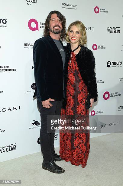 Musician Dave Grohl and Jordyn Blum attends the 24th Annual Elton John AIDS Foundation's Oscar Viewing Party on February 28, 2016 in West Hollywood,...
