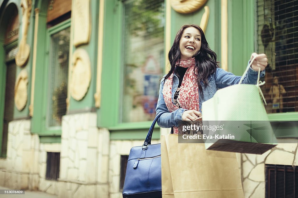 Young woman with shopping bags