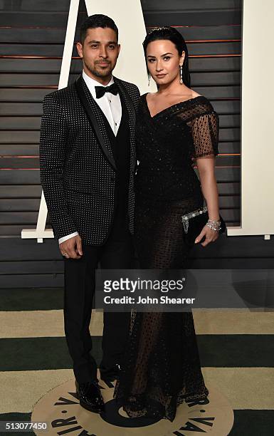 Actor Wilmer Valderrama and singer Demi Lovato arrive at the 2016 Vanity Fair Oscar Party Hosted By Graydon Carter at Wallis Annenberg Center for the...