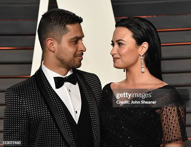 Actor Wilmer Valderrama and singer Demi Lovato arrive at the 2016 Vanity Fair Oscar Party Hosted By Graydon Carter at Wallis Annenberg Center for the...