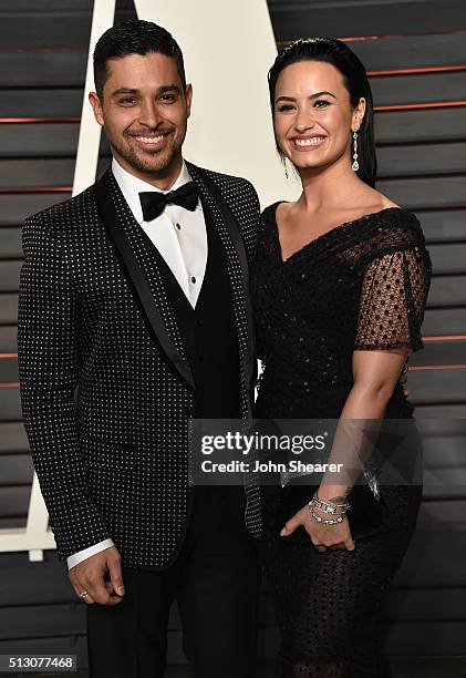 Actor Wilmer Valderrama and singer Demi Lovato arrive at the 2016 Vanity Fair Oscar Party Hosted By Graydon Carter at Wallis Annenberg Center for the...