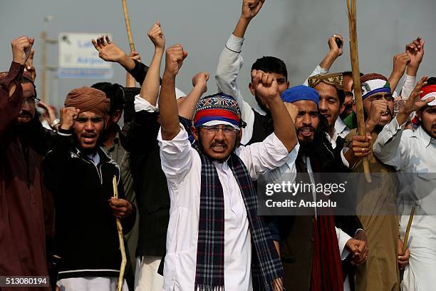 Supporters of Mumtaz Qadri, killed former Punjab governor Salman Taseer 5 years ago, stage a protest against his execution on the main highway in...